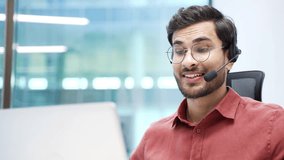 Corporate operator who works in customer support speaks on a video call using a laptop. Call center agent in wireless headset helping clients with complaints in office. Online consultation. Close up - Powered by Shutterstock - Get 15% off with code: PIKWIZARD15