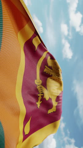 Wavy flag of Sri Lanka blowing in the wind in slow motion. Waving official Sri Lanka flag team symbol abstract vertical background. Blue sky with clouds. World countries flying flags concept