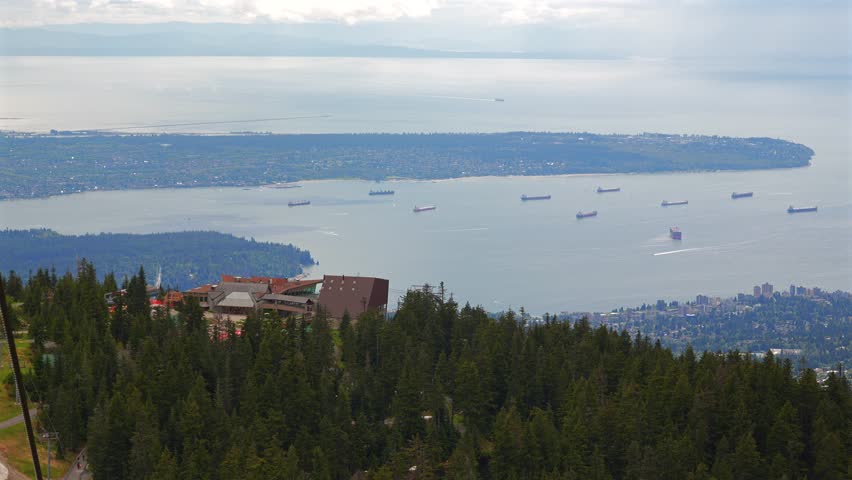 Panoramic view from Grouse Mountain, Vancouver, Canada, with Ocean view, Cargo ships, and Nature