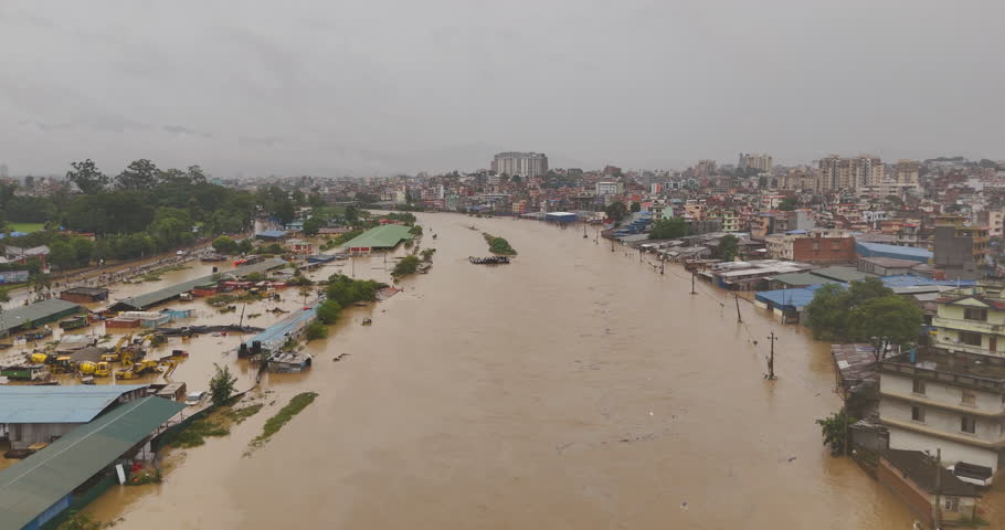 Drone shot flooded Kathmandu urban city, where cloudburst during monsoon rains devastated landscape and destroyed infrastructures destructive impact of ongoing climate crisis on urban civilization