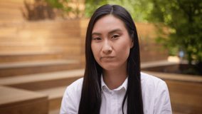 Close up Asian Korean woman businesswoman negative waving shaking head answer no rejection disagreement city business girl deny prohibit refuse portrait female student never not lady warning outdoors - Powered by Shutterstock - Get 15% off with code: PIKWIZARD15