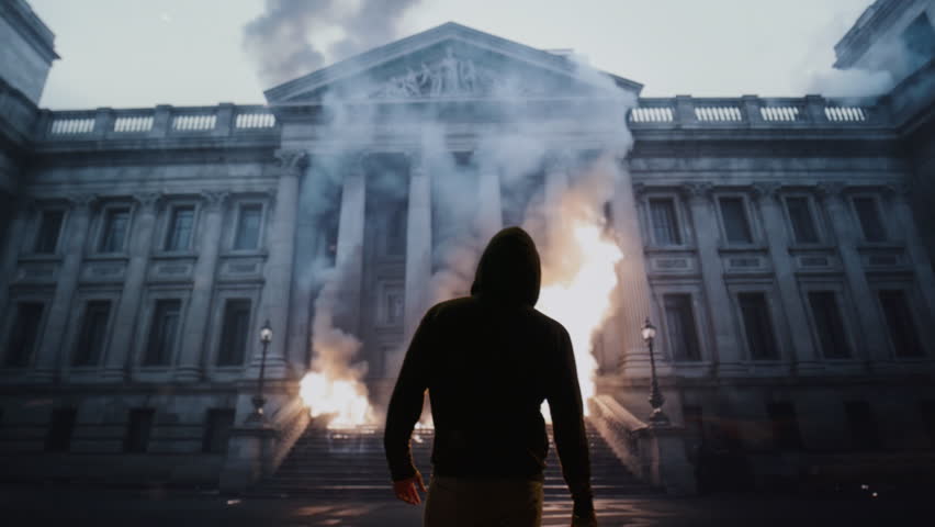 Mysterious Hooded Man Outside Historic Building With Smoke Flare Urban Revolution Rebellion