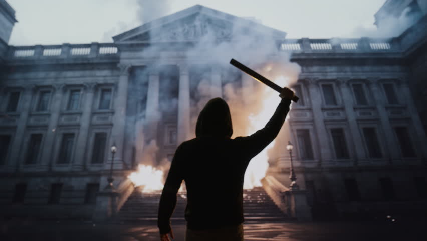 Silhouetted Man With Flare Outside Historic Building Revolution Protest Anarchy Unrest Movement