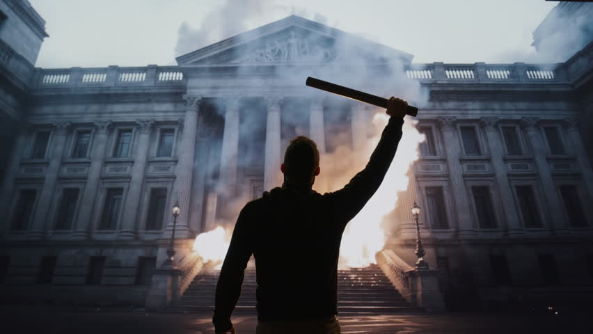 Silhouetted Man Standing Before Historic Building With Smoke And Fire Revolution Protest Authority