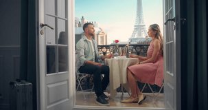 Portrait of a Male and Female in Love Clinking Their Champagne Glasses on a Scenic Parisian Balcony with a View of an Eiffel Tower. With Smiles and a Toast, They Celebrate and Cherish the Moment - Powered by Shutterstock - Get 15% off with code: PIKWIZARD15