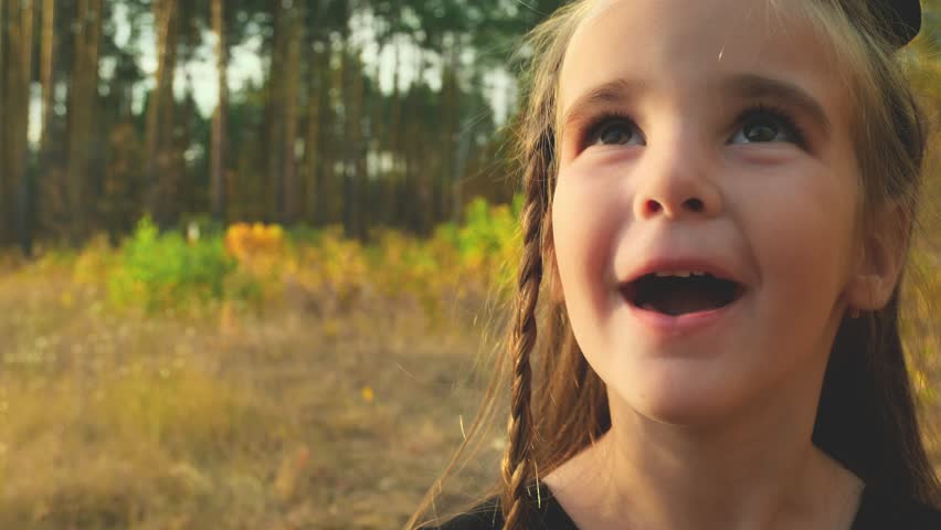 Video portrait of happy girl trick or treating for halloween. Childhood, halloween, tradition and fun concept.