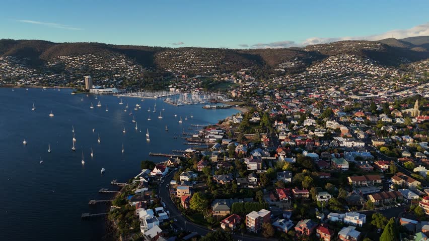 Sandy Bay and riverside at sunset, Hobart City in Tasmania, Australia. Aerial drone view