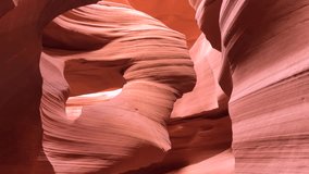 Experience the breathtaking beauty of Antelope Canyon, where sunlight illuminates swirling sandstone formations, creating mesmerizing patterns and vibrant colors, especially enchanting at midday. - Powered by Shutterstock - Get 15% off with code: PIKWIZARD15