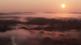 Ground fog over small town during sunrise filmed with drone - Powered by Shutterstock - Get 15% off with code: PIKWIZARD15