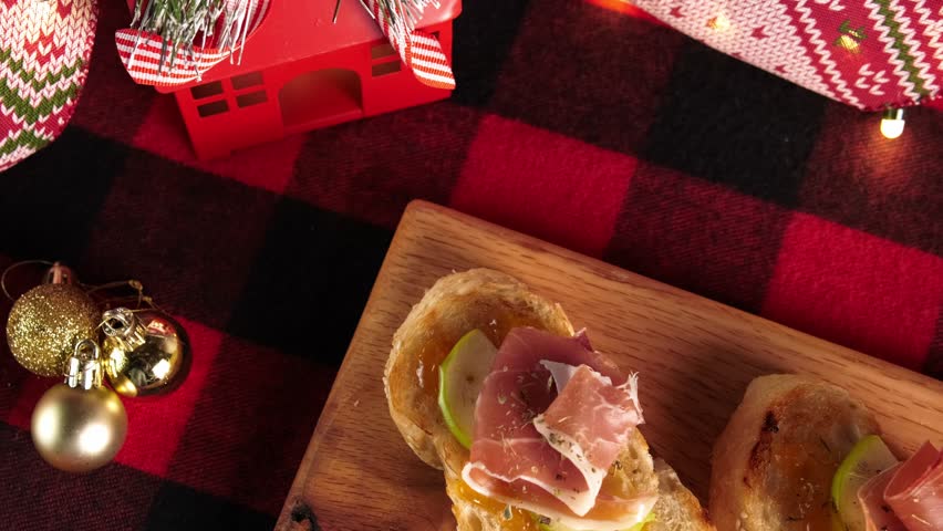 High angle view of Christmas dinner food, Serrano ham pintxos, Christmas background