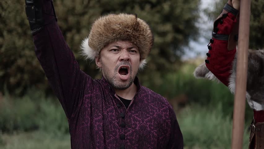 Warriors lifting their swords and yelling for their battle