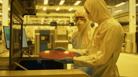 Semiconductor Fabrication Process Lab: Engineers In Cleanroom Protective Suits Inspect A Silicon Wafer, Lithography Exposure In An DUV Scanner. Special Tech Lighting Conditions - Powered by Shutterstock - Get 15% off with code: PIKWIZARD15
