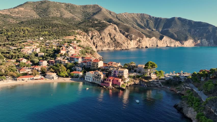 Aerial View of Assos, Kefalonia, Greece. This Charming Village is Nestled Between the Mountains and the Clear Blue Water. Fly around Assos village, Kefalonia island, Greece