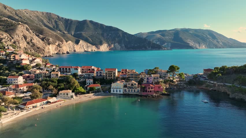 Aerial View of Assos, Kefalonia, Greece. This Charming Village is Nestled Between the Mountains and the Clear Blue Water. Fly around Assos village, Kefalonia island, Greece