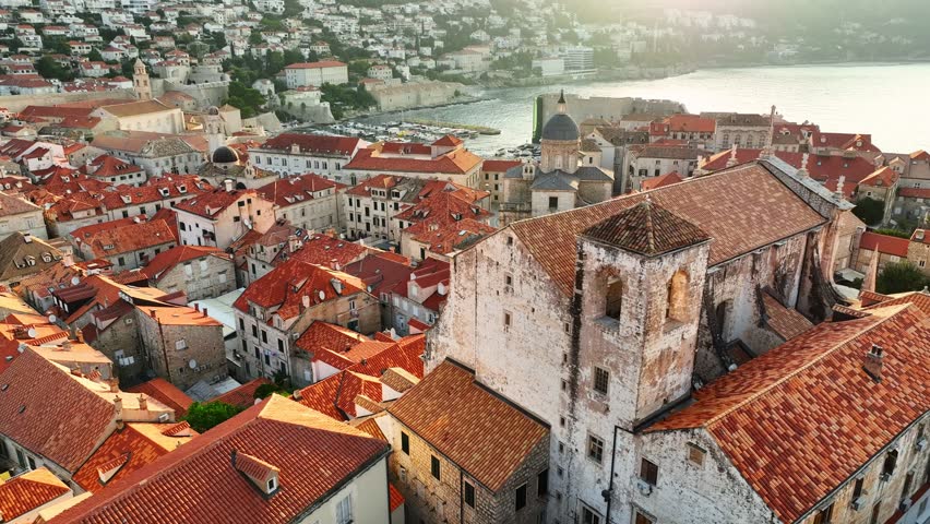 Stunning Rooftops and Historic Architecture of Dubrovnik, Croatia at Sunset Overlooking the Picturesque Adriatic Coast. Church of St. Ignatius in Dubrovnik old city 