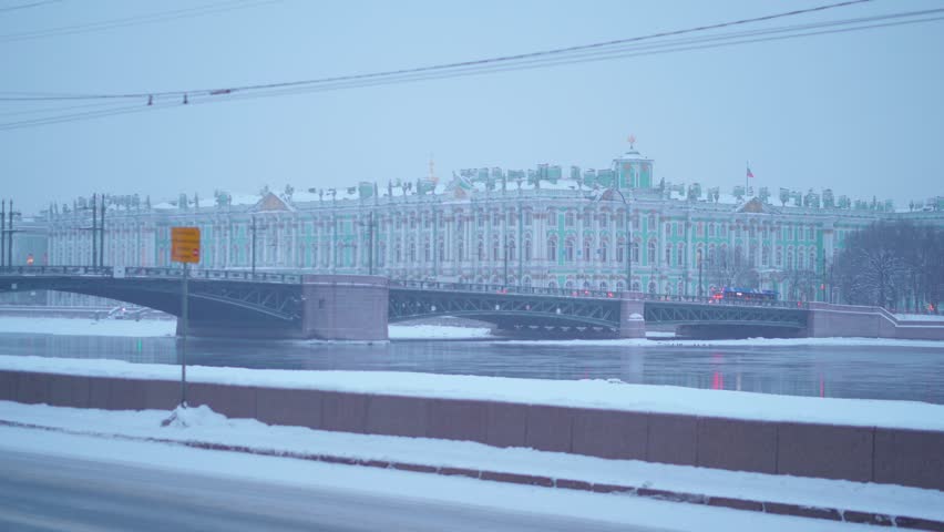 Saint Petersburg, Russia - Feb 06 2021, 4k, Panoramic view of the Hermitage and the Palace Bridge from the Neva River, in winter, at evening, St Petersburg, Russia 