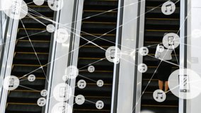 Animation of network of connections with icons over caucasian businesswoman on escalator. Global finance, business, connections, computing and data processing concept digitally generated video. - Powered by Shutterstock - Get 15% off with code: PIKWIZARD15