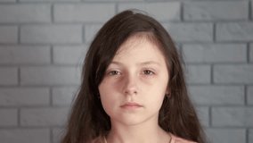 Child with close eye peek indoor. A view of little girl put her palm by eye and look something in the room. - Powered by Shutterstock - Get 15% off with code: PIKWIZARD15