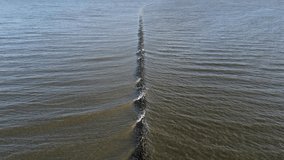Low stone jetties protect harbour in Parnu, Estonia from silting up - Powered by Shutterstock - Get 15% off with code: PIKWIZARD15