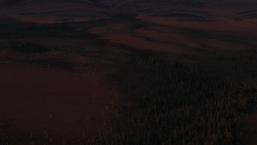 Reveals Sunset Mountain Near The Arctic Circle In The North Of Yukon Territory, Canada. Tilt-up Shot