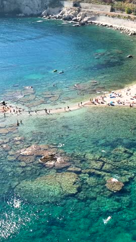 The sea and the beach of Isola Bella in Taormina, Sicily, Southern Italy.
Aerial shot of the bay of Taormina with Isola Bella connected to the mainland by an isthmus of land.