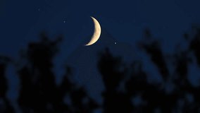 Crescent Moon, stars, planet conjunction and landscape scenery silhouettes.	
 - Powered by Shutterstock - Get 15% off with code: PIKWIZARD15