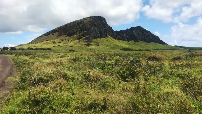 A beautiful sunny landscape over Ranu a Raraku in a summer day in Easter Island, Rapa Nui, Polynesia, Chile, Latin America