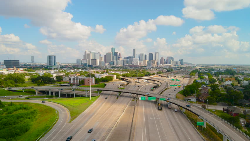 Aerial Establishing Downtown Houston Texas, skyline Traffic Skyscraper buildings, famous American city, Texas 288 freeway. Drone shoot the Texas 288 overlooking Houston Downtown. Houston Intro