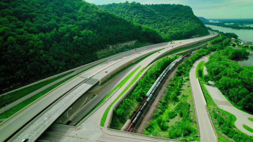 Aerial view of Interstate I-90 above La Crosse, Minnesota, with train tracks alongside