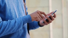 Animation of network of connections with icons over biracial businessman using smartphone. Global business, social media, digital interface and data processing concept digitally generated video. - Powered by Shutterstock - Get 15% off with code: PIKWIZARD15