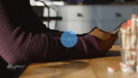 Animation of network of connections with icons over biracial businessman using smartphone. Global business, social media, digital interface and data processing concept digitally generated video. - Powered by Shutterstock - Get 15% off with code: PIKWIZARD15