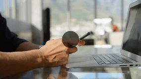 Animation of network of connections with icons over caucasian businessman using smartphone. Global business, social media, digital interface and data processing concept digitally generated video. - Powered by Shutterstock - Get 15% off with code: PIKWIZARD15