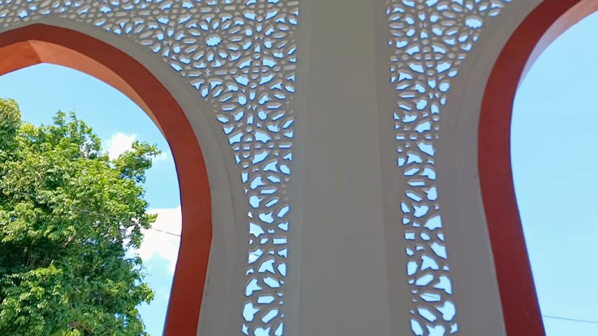 Beautiful mosaic decoration inside the mosque. Ornaments on the ceiling of a medieval mosque building. Mosque decoration.