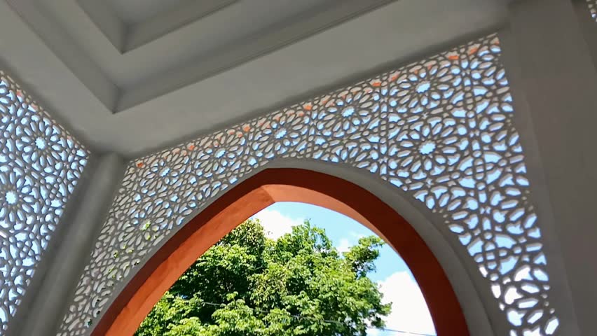 Beautiful mosaic decoration inside the mosque. Ornaments on the ceiling of a medieval mosque building. Mosque decoration.
