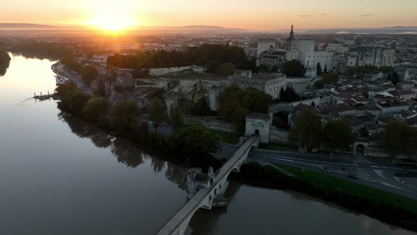 Aerial view of Rhone river and French town of Avignon in Provence, France, ruins of medieval bridge on the Rhone. Pont Saint-Benezet bridge in France