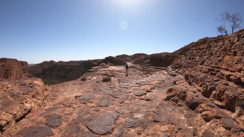 Caucasian woman walking in Kings Canyon in Watarrka National Park, Australia