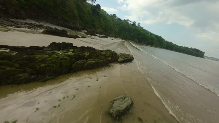 Low Fly Over Plage Du Ris Sandy Beach During Low Tide In Douarnenez, Brittany France. FPV Shot