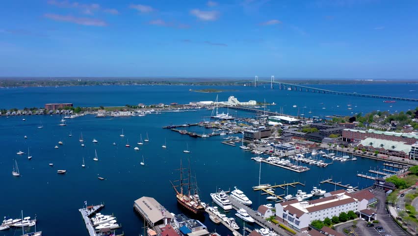 Aerial Drone of Sailboats in Newport Harbor with Pell Bridge Rhode Island Blue Skies Perfect Weather