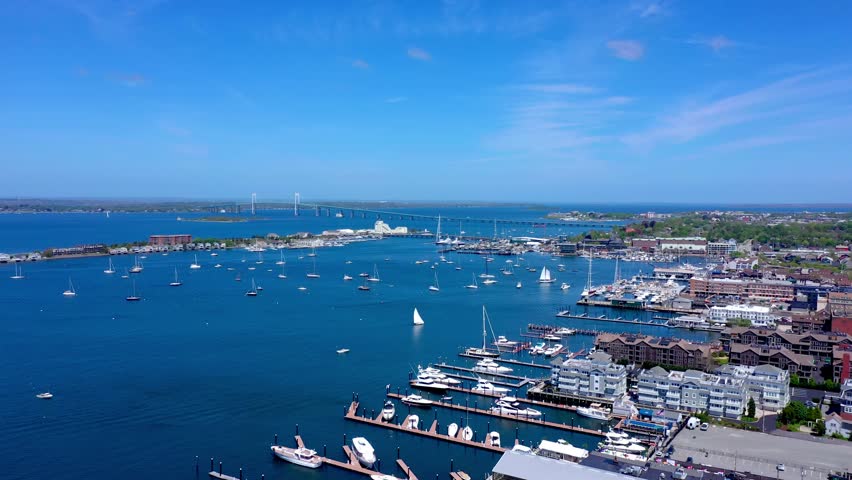 Aerial Drone of Sailboats in Newport Harbor with Pell Bridge Rhode Island Blue Skies Perfect Weather