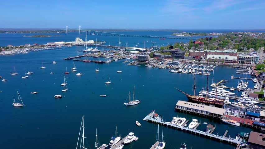 Aerial Drone of Sailboats in Newport Harbor with Pell Bridge Rhode Island Blue Skies Perfect Weather