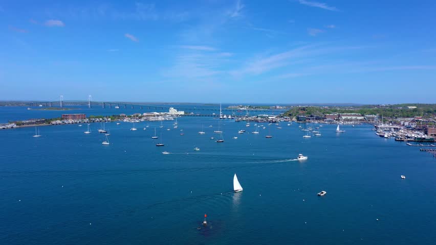 Aerial Drone of Sailboats in Newport Harbor with Pell Bridge Rhode Island Blue Skies Perfect Weather