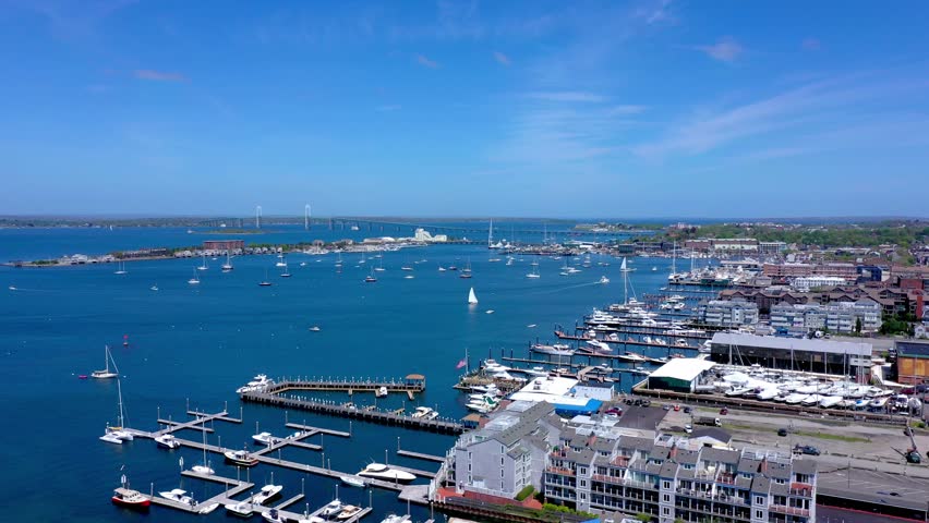 Aerial Drone of Sailboats in Newport Harbor with Pell Bridge Rhode Island Blue Skies Perfect Weather
