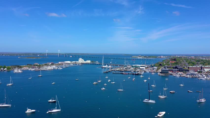 Aerial Drone of Sailboats in Newport Harbor with Pell Bridge Rhode Island Blue Skies Perfect Weather