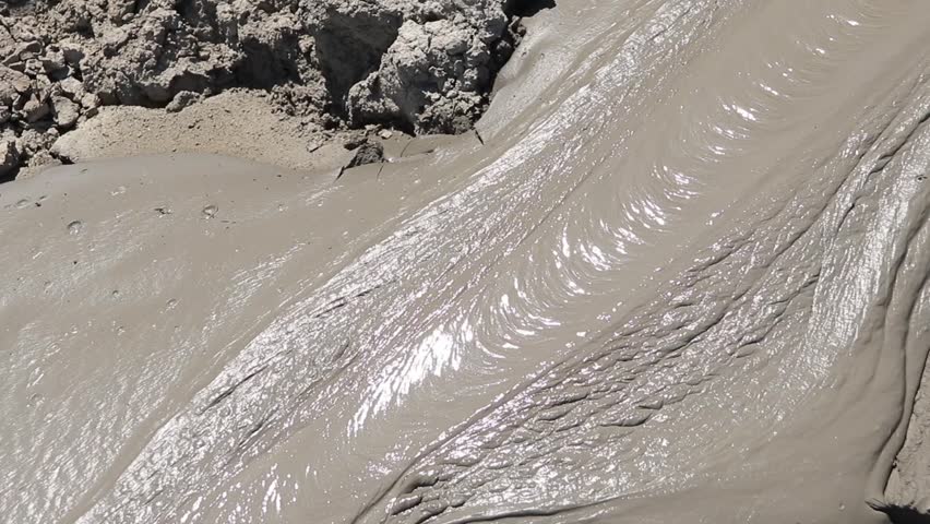 A mud volcano formed by underground liquefied soil mixed with gas and water, pushing up to the surface, Azerbaijan