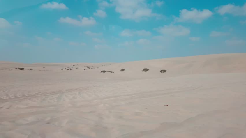 People enjoy safari tour at the Sealine Desert in Qatar