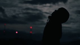 Silhouette of the person watching in the night sky - Powered by Shutterstock - Get 15% off with code: PIKWIZARD15