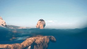 Swimming On Mediterranean Sea Beach. Cinematic Inspiration Travel Holiday Trip. Fresh Sea Breeze Summertime Vacation Vibes. Wanderlust Explorer Have Great Time Mood. Happy Tourist On Greek Island - Powered by Shutterstock - Get 15% off with code: PIKWIZARD15