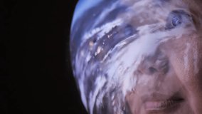 Portrait of young asian woman astronaut face in helmet with planet and sky reflection in glass. Interplanetary expedition to outer space with woman in astronaut team. Space research - Powered by Shutterstock - Get 15% off with code: PIKWIZARD15