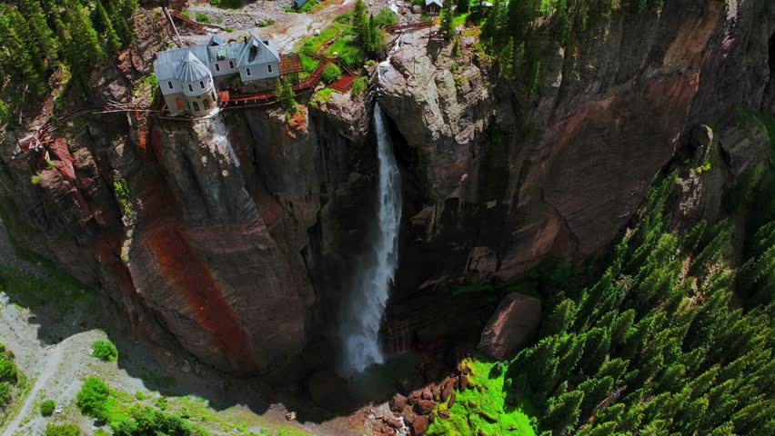 Summer green Telluride Bridal Veil Falls Waterfall Colorado powerplant house aerial drone Box Canyon Black Bear Pass Road Rocky Mountains 4wd hiking blue sky cliffside Uncompahgre Forest circle right