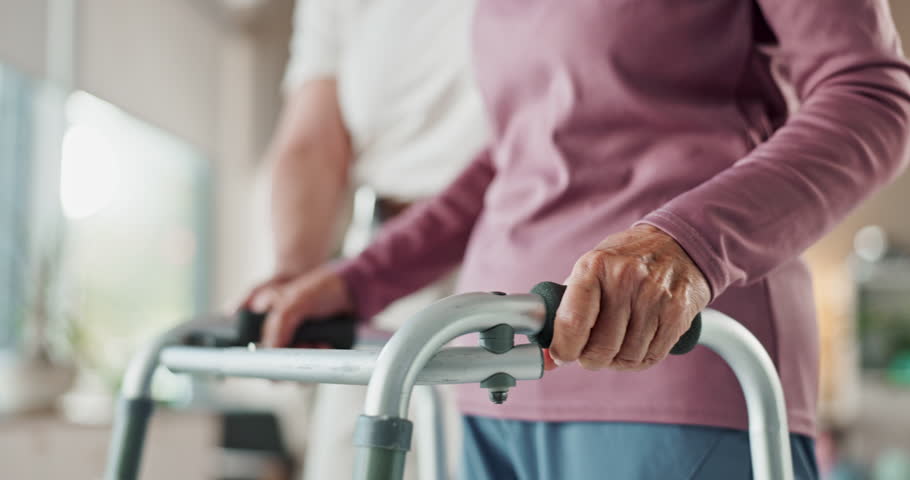 Rehabilitation, walker and physiotherapy with hands of people for retirement, helping and consulting. Medical, osteoporosis and exam with closeup of person for caregiver, support and elderly care